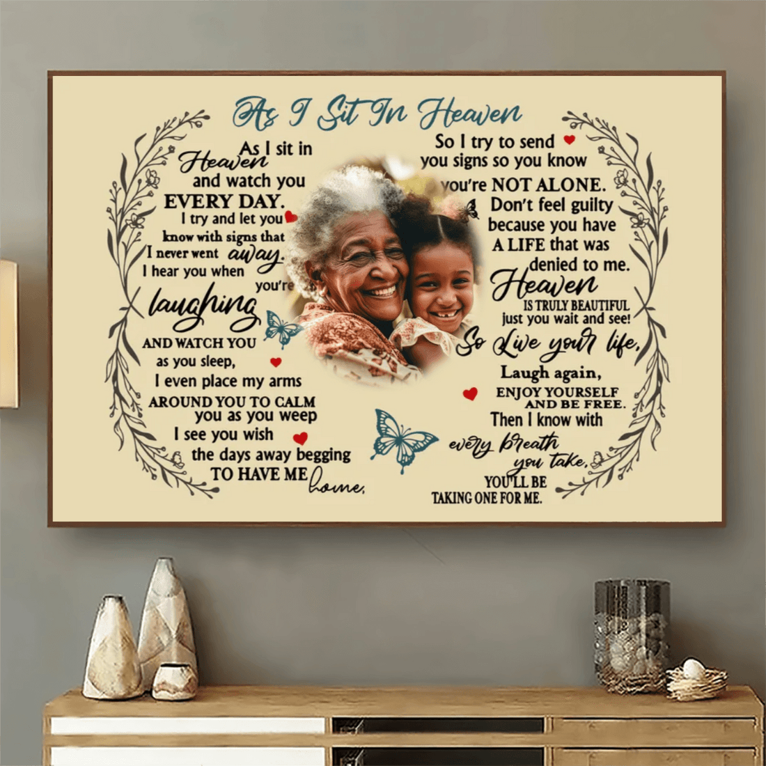 Personalized Custom Photo As I Sit In Heaven canvas print, a woman hanging the framed print on a wall