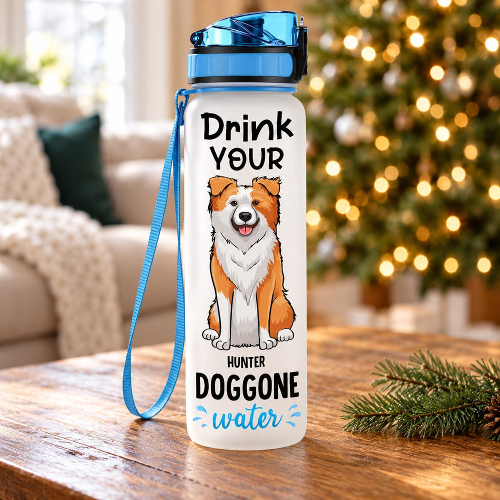 Personalized Dog Mom 32oz water tracker bottle with Hunter dog print by a Christmas tree