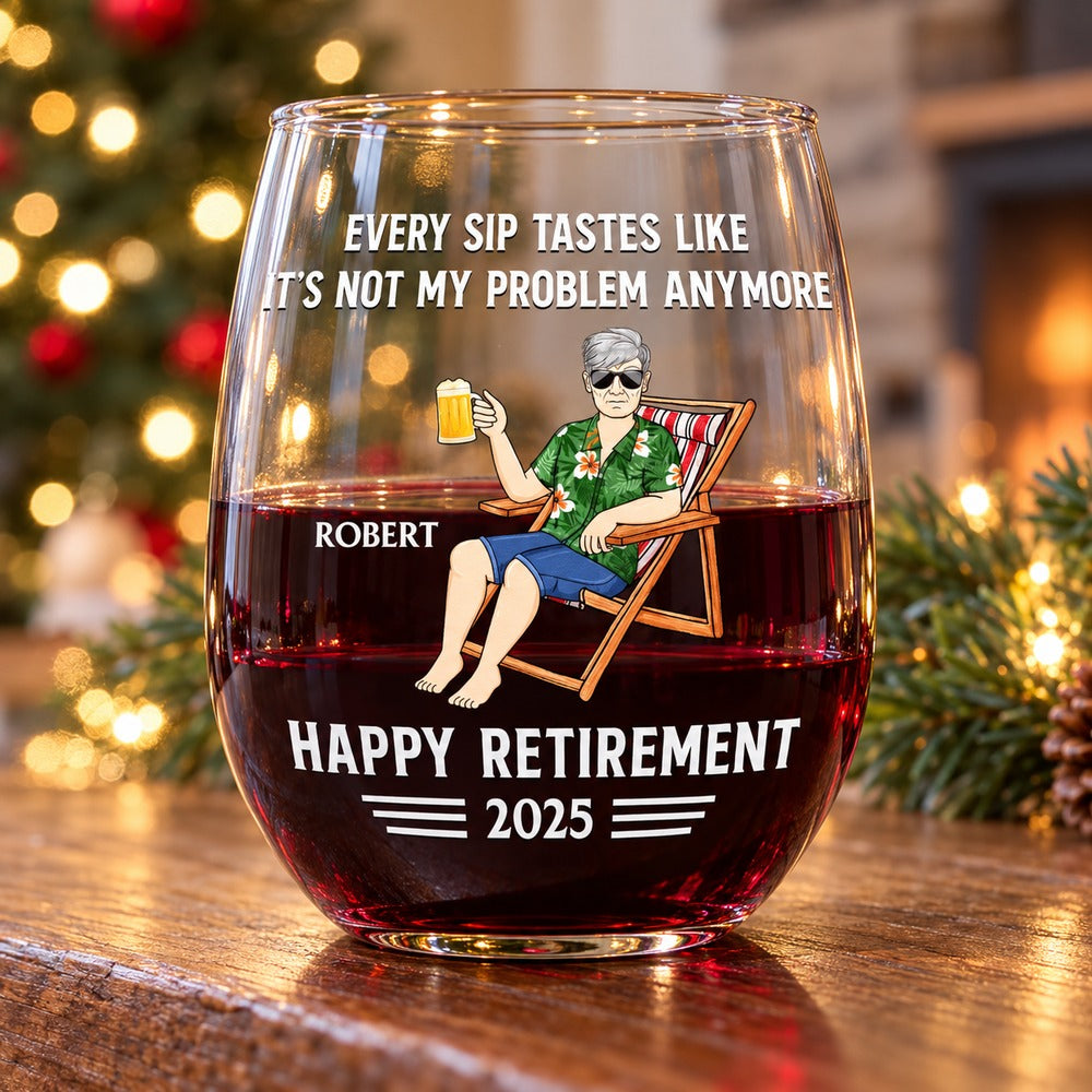 Personalized retirement stemless wine glass with Robert design on holiday mantel