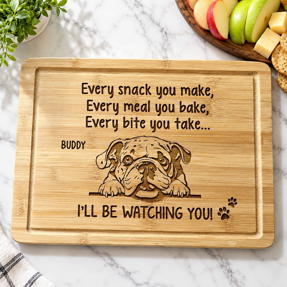Engraved wooden cutting board for dog lovers on counter with snacks and cheese