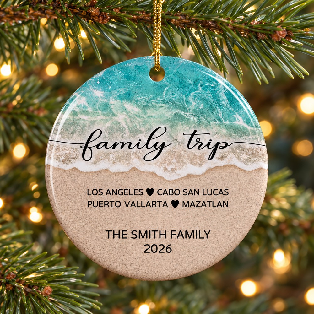 Family Beach Vacation personalized ceramic ornament 2026 hanging on a Christmas tree branch