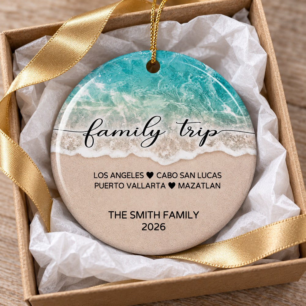 Family Beach Vacation ceramic ornament nestled in a gift box with white tissue paper