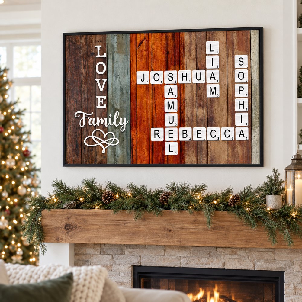 Family Crossword Art canvas print hanging above a holiday mantel with pine garland
