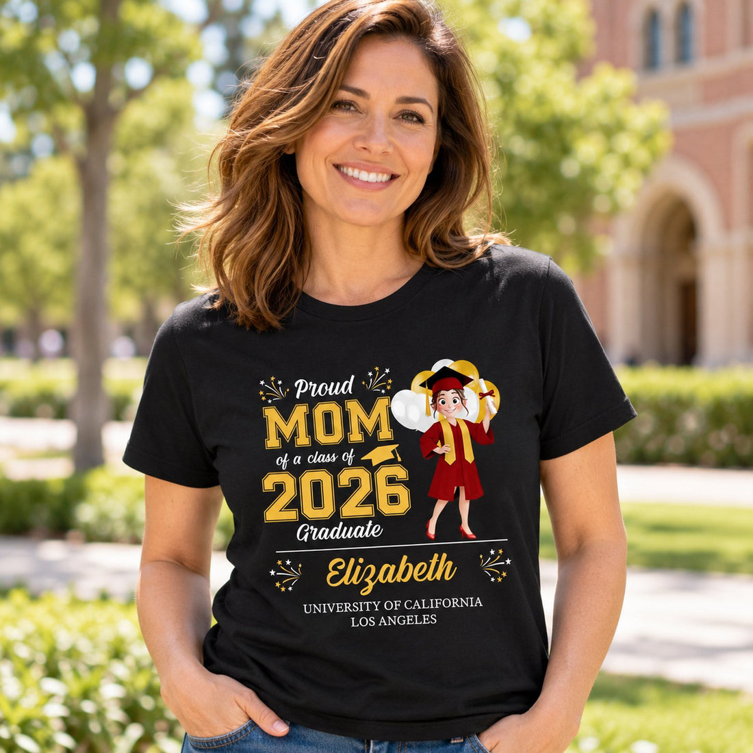 Mom wearing personalized Proud Mom of a Class of 2026 Graduate t-shirt outdoors