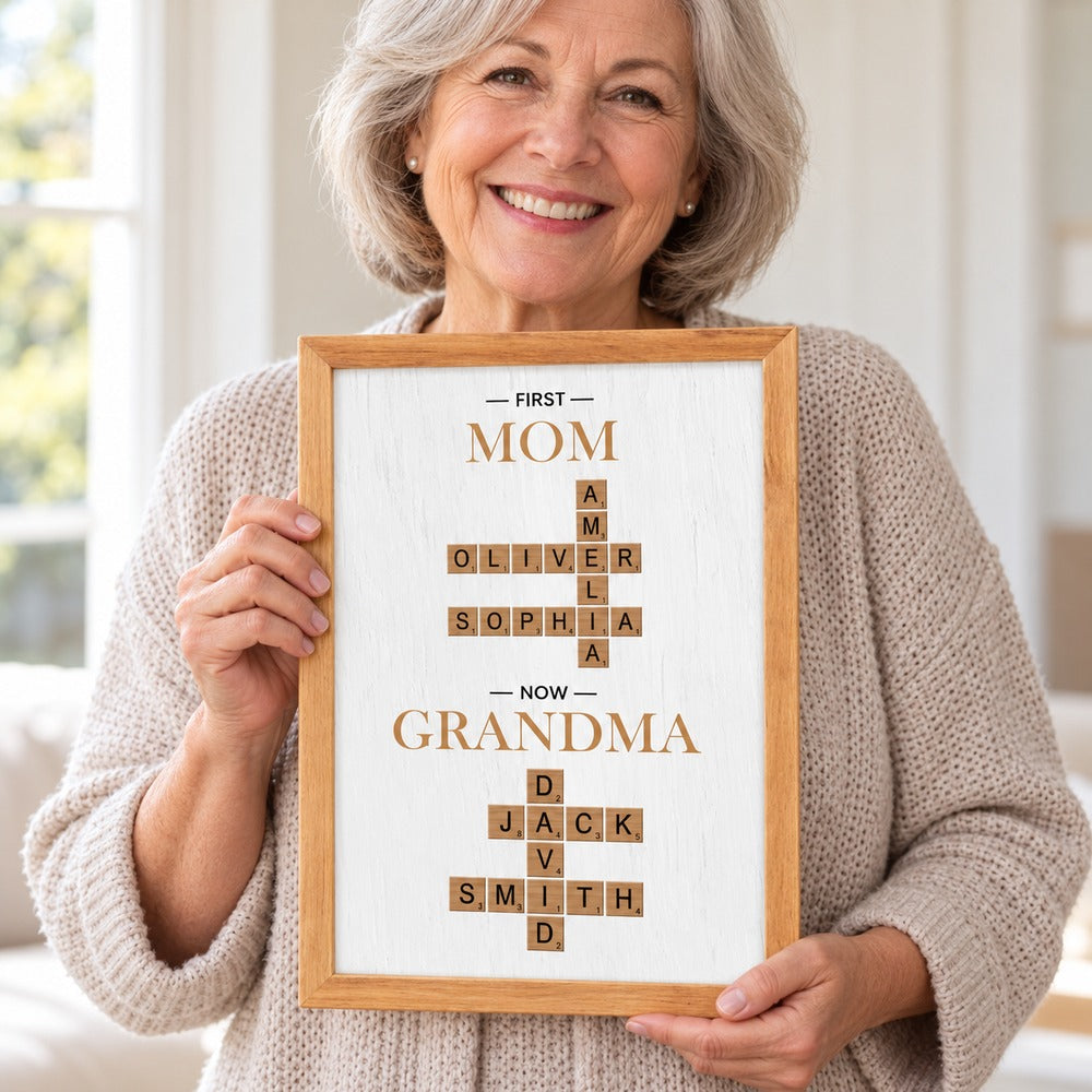 Grandma holding her personalized First Mom Now Grandma crossword wall art