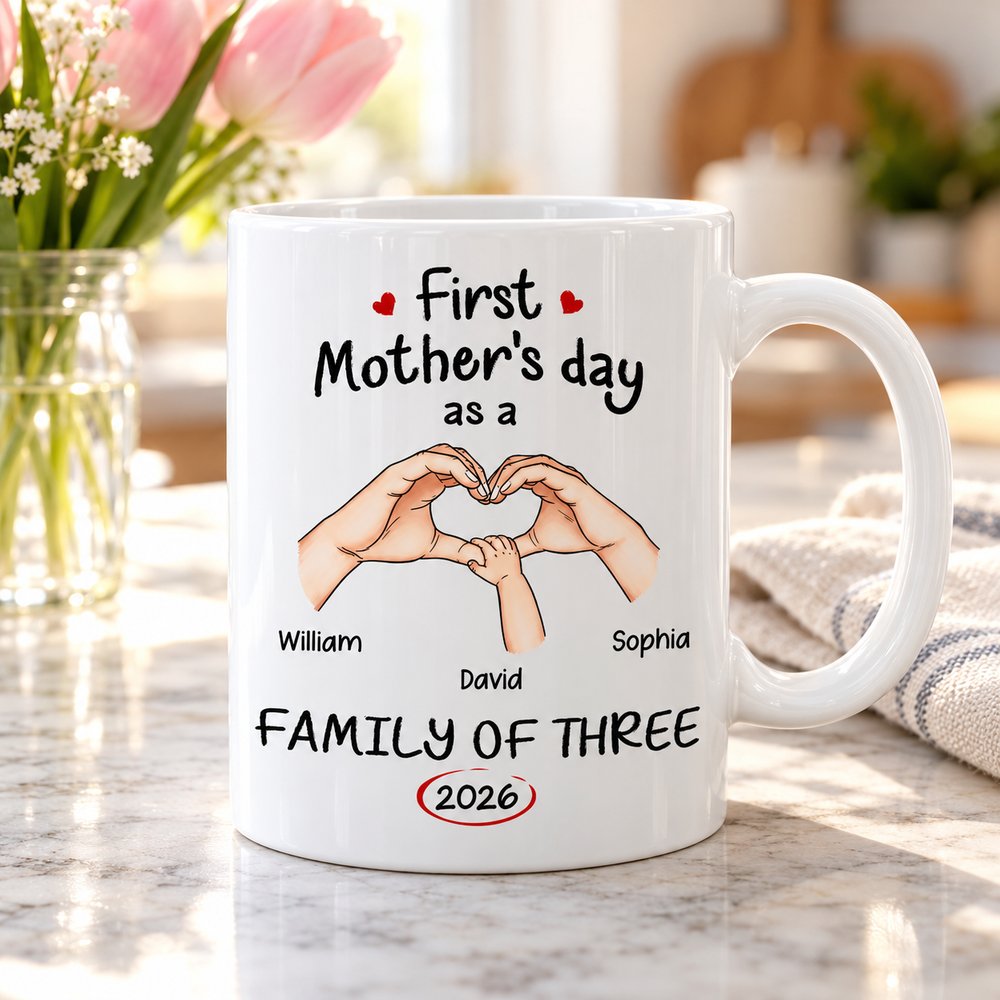 Personalized First Mother's Day Family of Three mug on sunlit marble counter with pink tulips