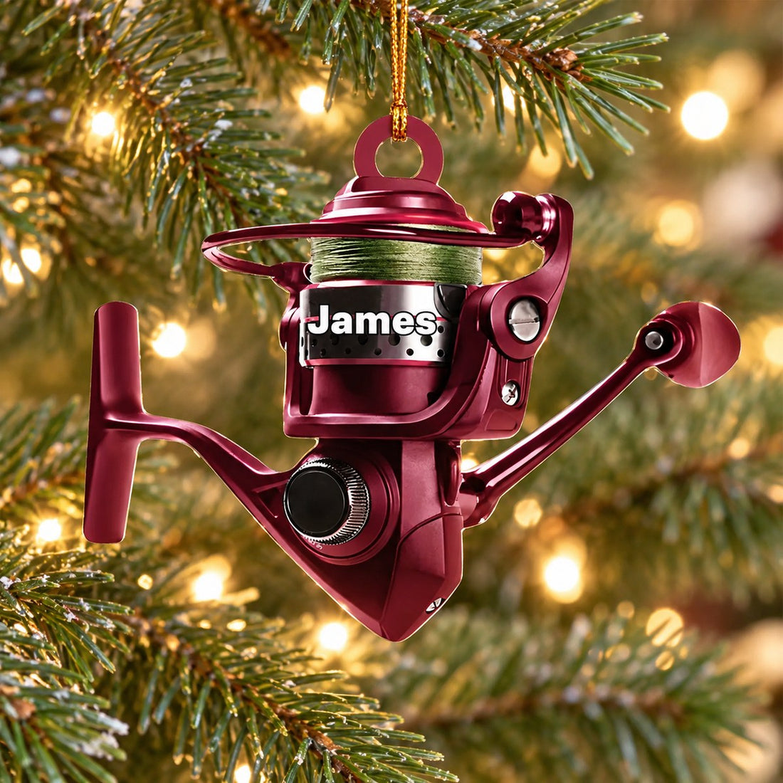 Personalized burgundy fishing reel acrylic Christmas ornament James hanging on pine tree branch