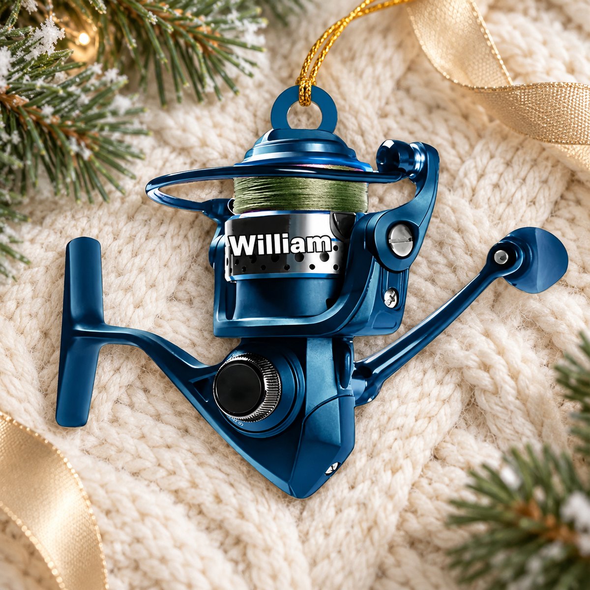 Blue personalized fishing reel Christmas ornament William lying flat on cozy cream knit fabric