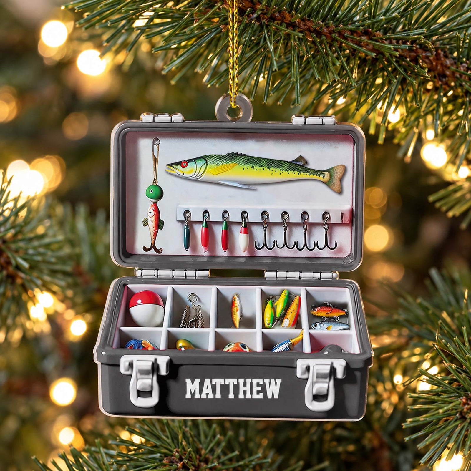 Personalized fishing tackle box flat acrylic ornament MATTHEW hanging on a Christmas tree branch
