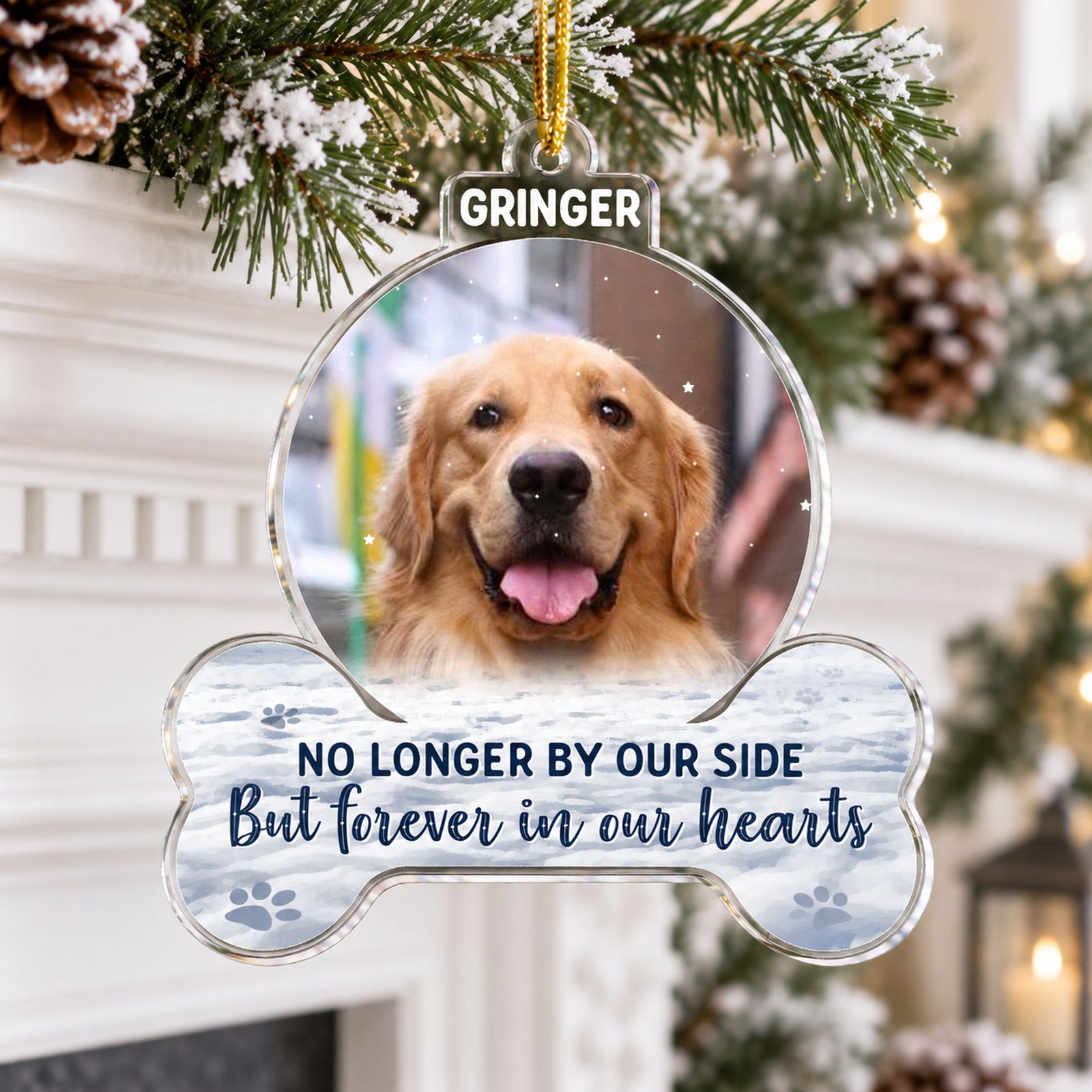 Personalized pet memorial acrylic ornament hanging on a holiday mantel garland