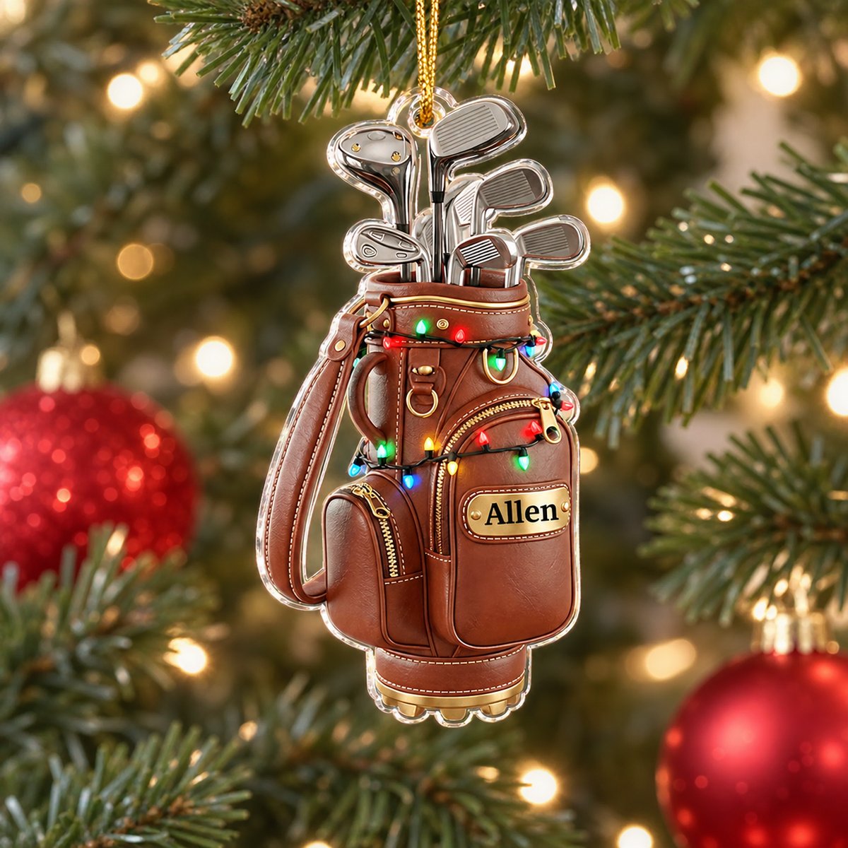 Personalized golf bag acrylic ornament hanging on a Christmas tree branch