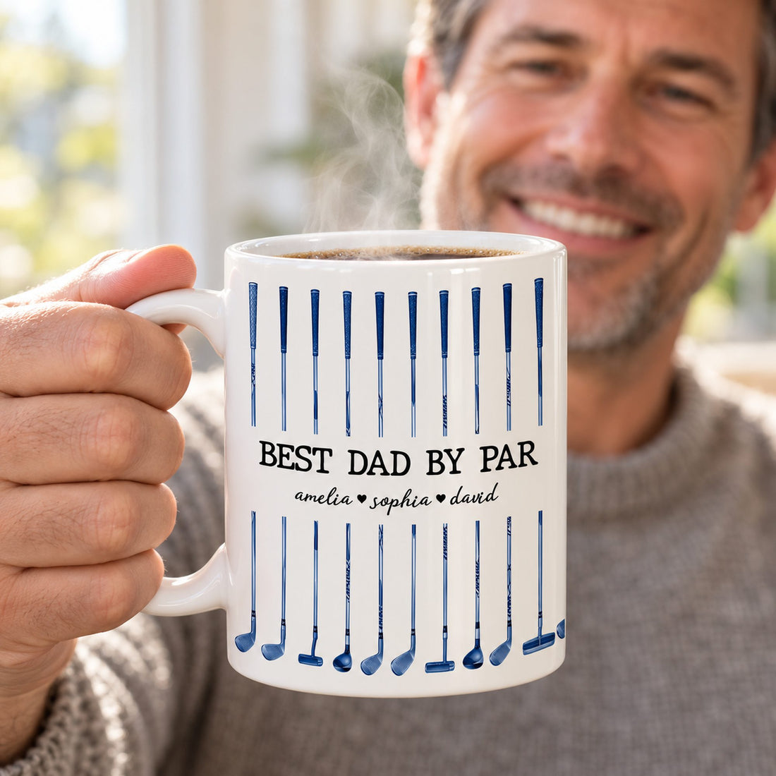 Dad holding steaming Best Dad By Par custom golf coffee mug on a bright morning