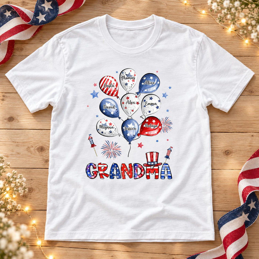 Personalized Grandma 4th of July shirt laid flat with patriotic ribbon