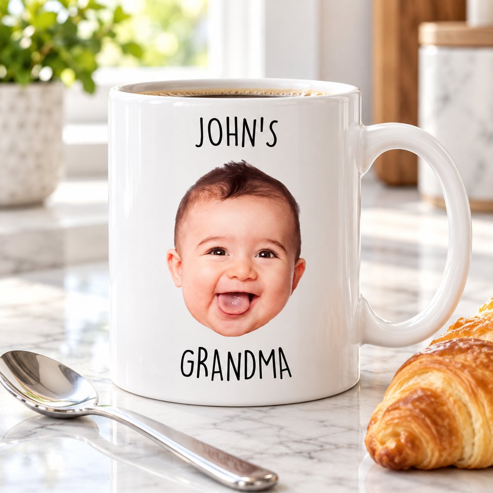 Custom photo Grandma mug next to a teaspoon and croissant on a counter for scale