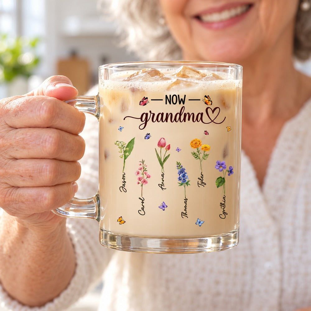 Grandma holding personalized birth month flower glass mug filled with latte