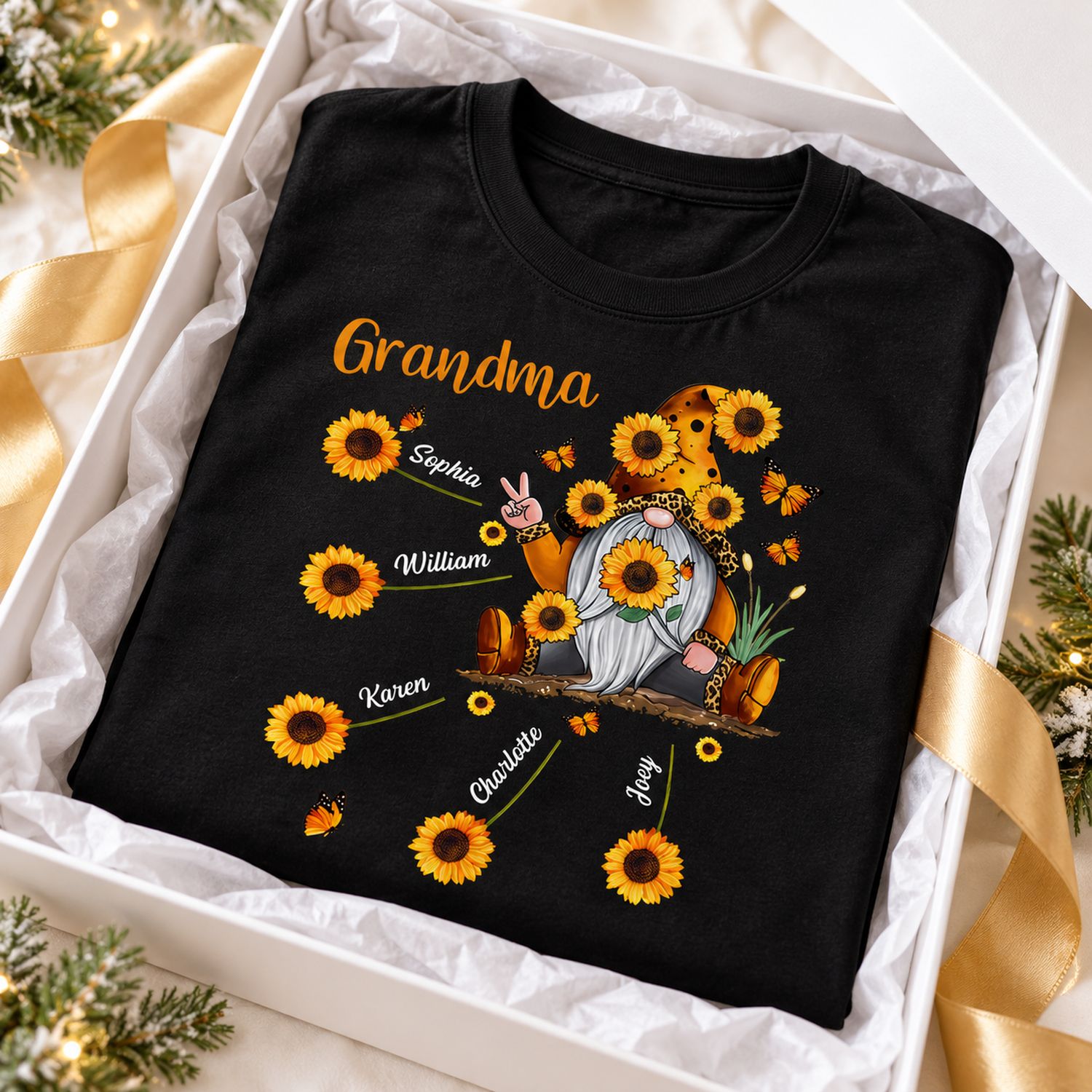 Personalized Grandma sunflower gnome t-shirt folded in an open gift box with ribbon for Christmas gifting
