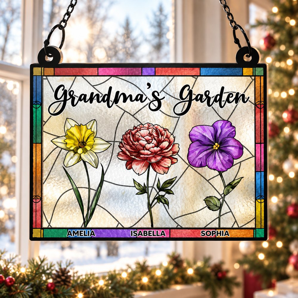 Personalized Grandmas Garden window suncatcher hanging near a Christmas tree
