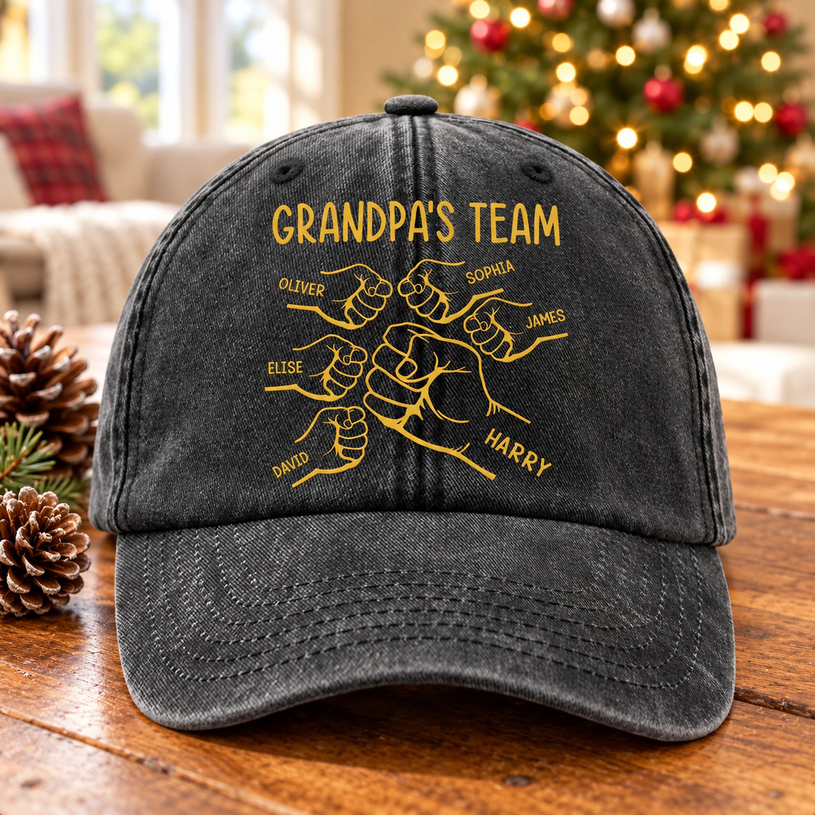 Personalized Grandpa's Team washed denim cap on table near Christmas tree