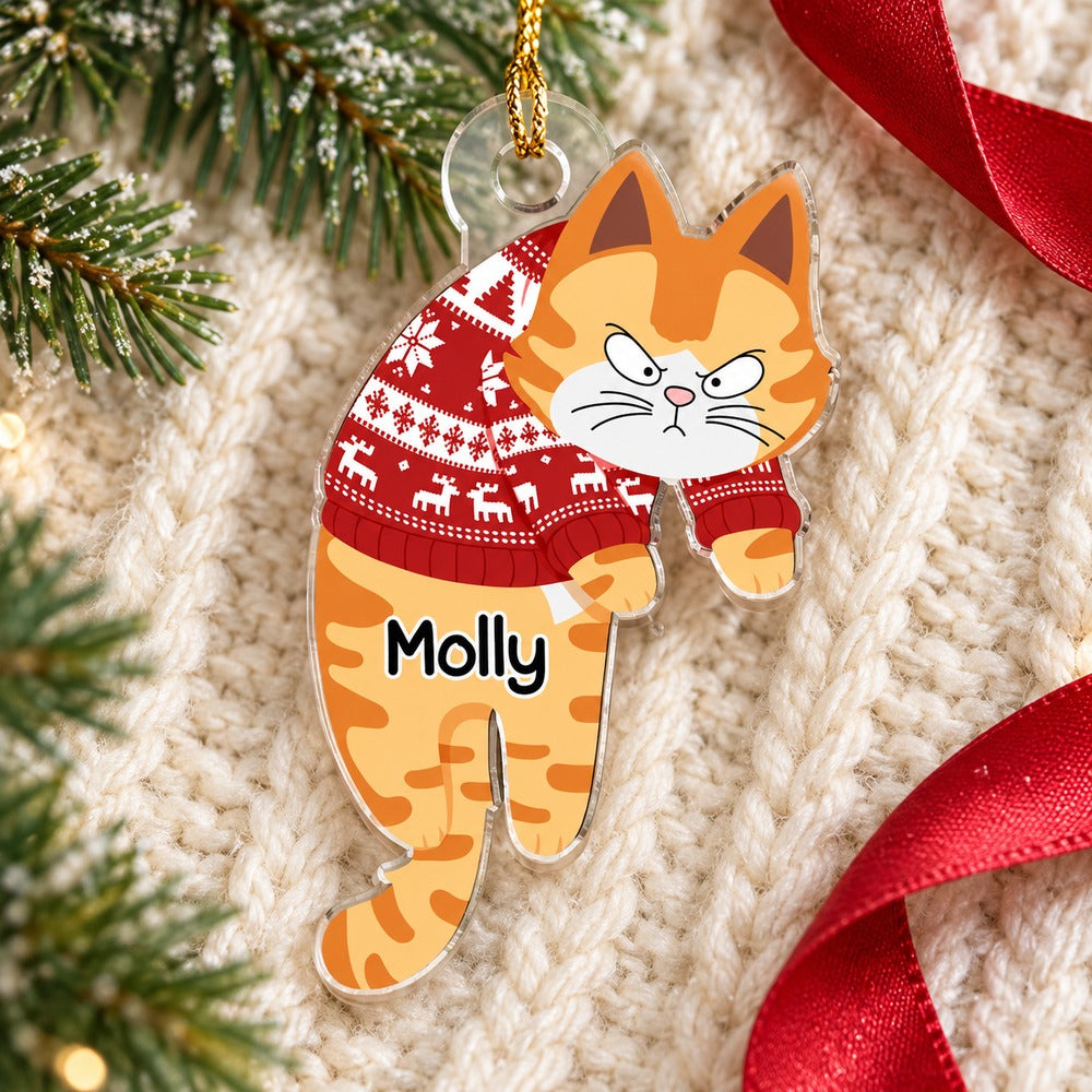Personalized hanging cat acrylic ornament Molly lying on a cozy cream knit blanket with pine
