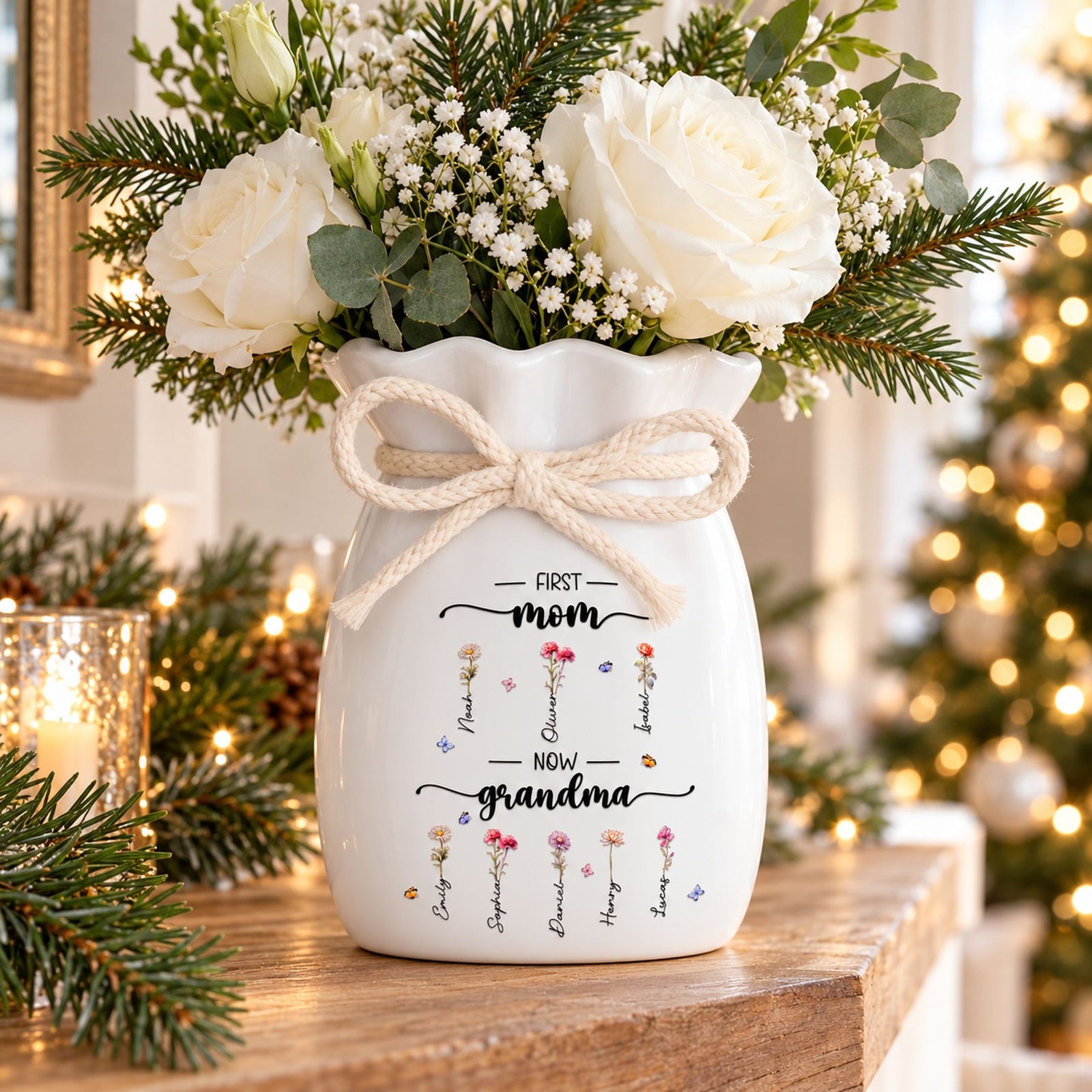 Personalized First Mom Now Grandma ceramic flower vase with rope bow on a holiday mantel