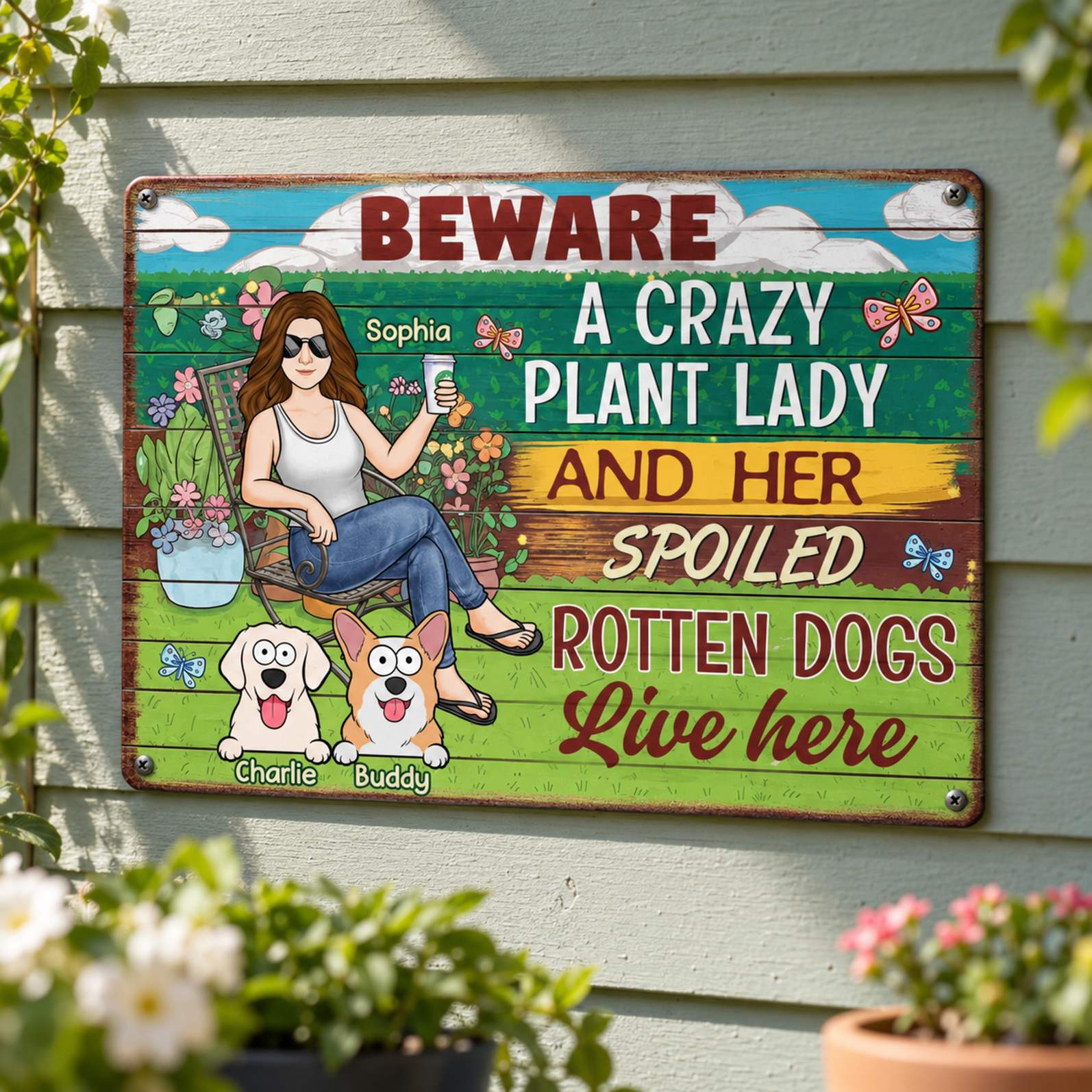 Personalized Crazy Plant Lady and Spoiled Rotten Dogs metal sign mounted on a wooden patio wall with greenery