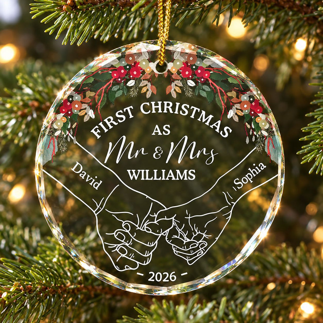 Personalized First Christmas Mr and Mrs circle glass ornament hanging on a Christmas tree branch