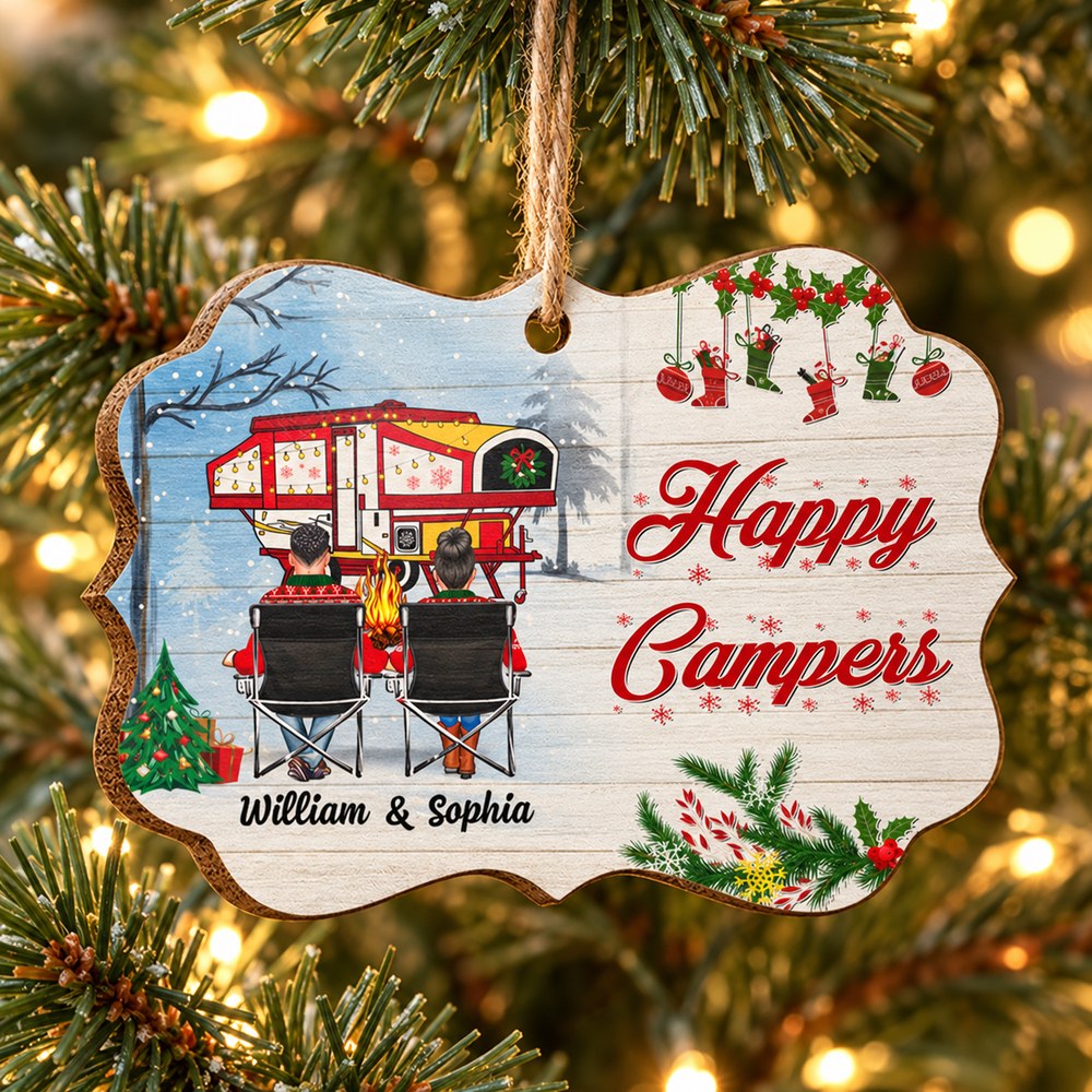 Personalized Happy Campers wooden medallion ornament hanging on a Christmas tree branch