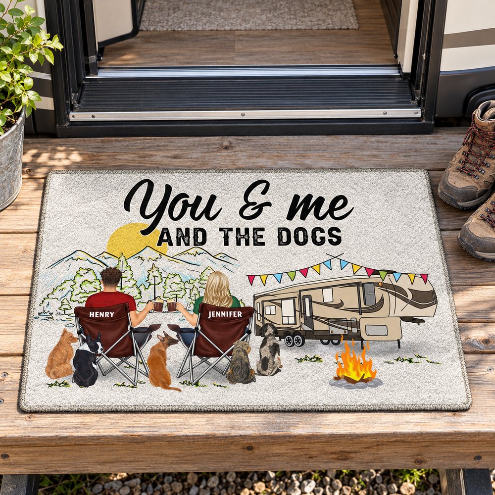 Personalized You And Me And The Dogs RV doormat placed at a camper doorway step