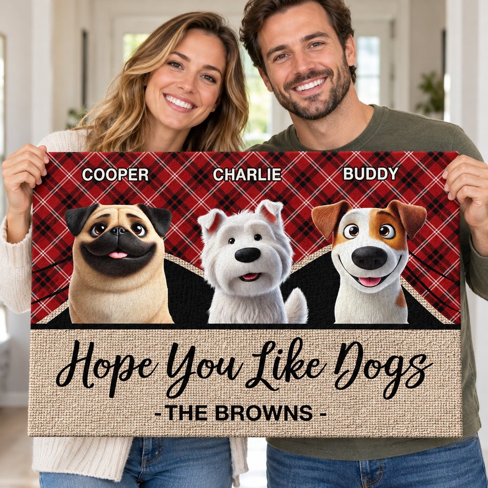 Couple holding their personalized Hope You Like Dogs doormat
