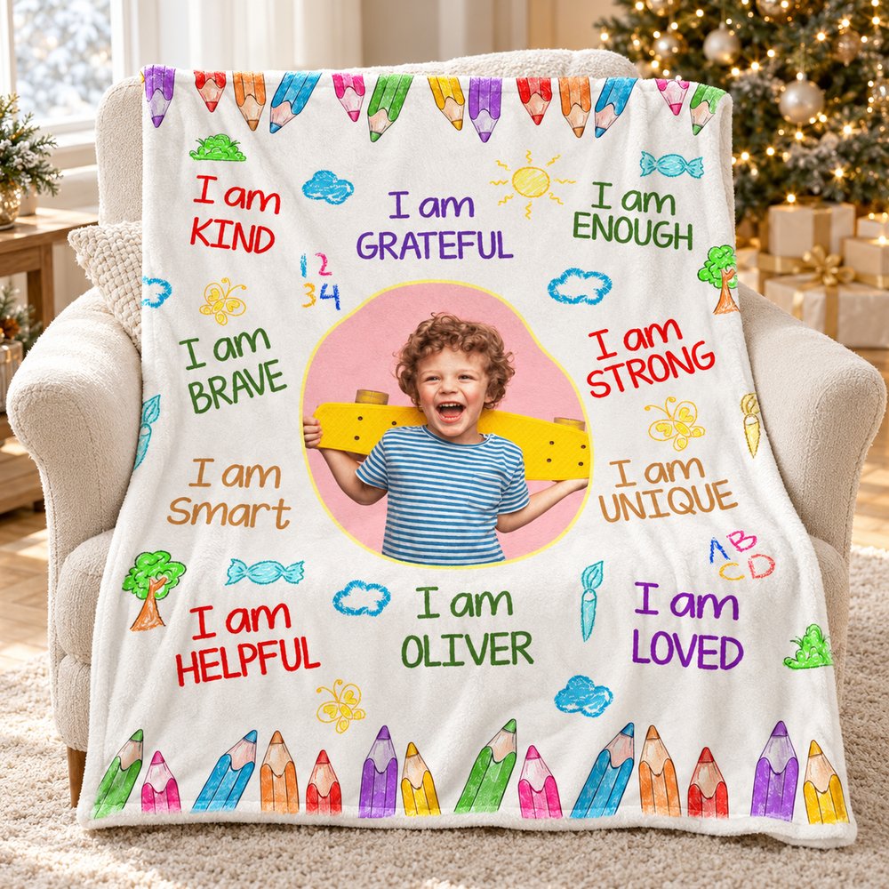 Personalized affirmations kid fleece blanket draped on armchair by a Christmas tree