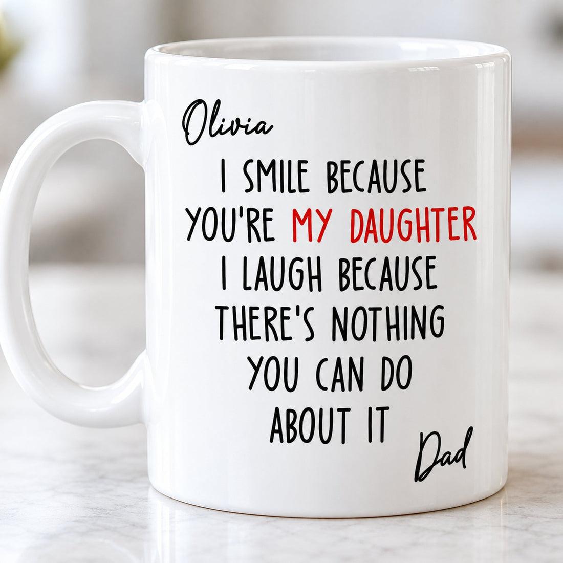 Close-up detail of glossy ceramic mug print with red and black lettering
