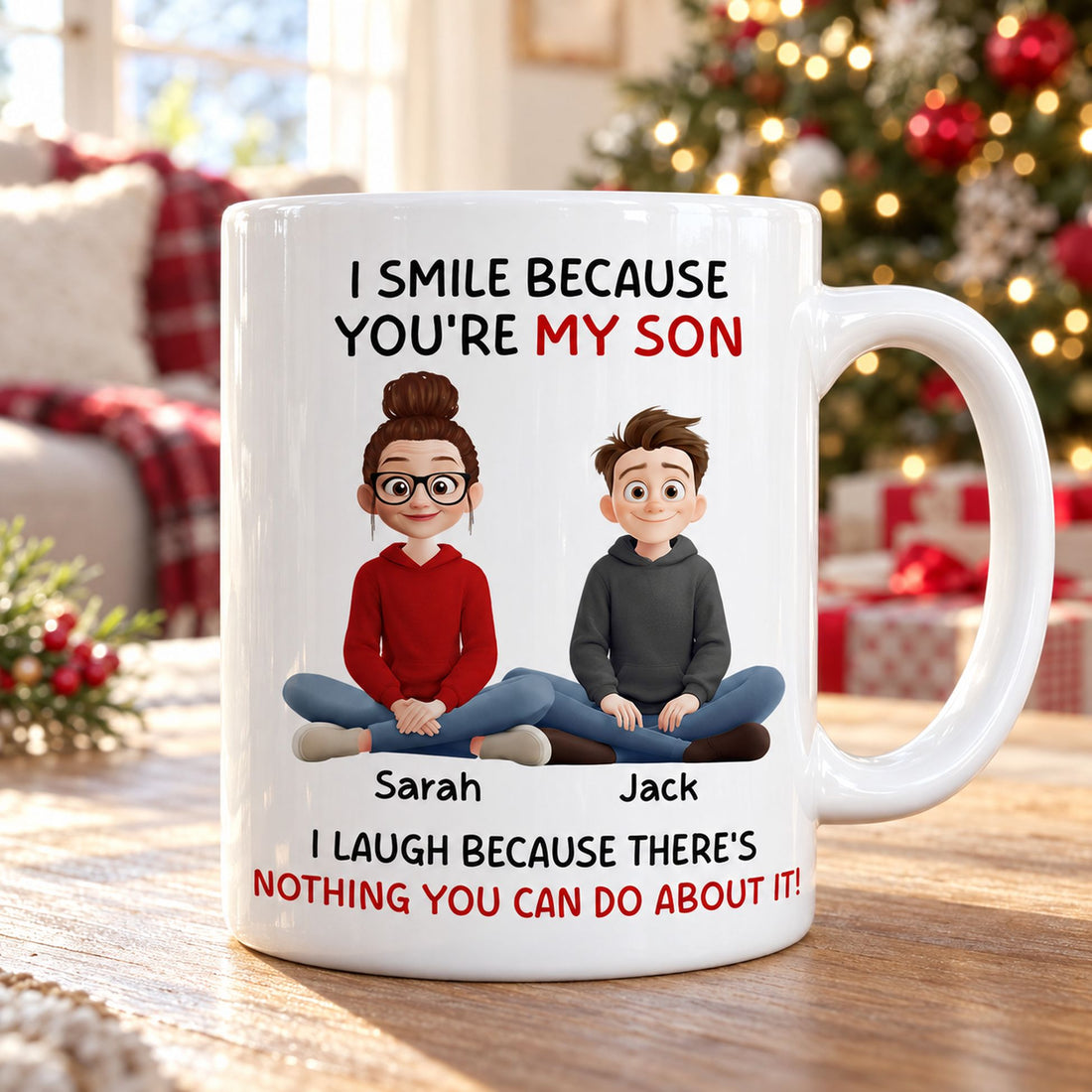 Personalized My Son ceramic mug on wooden table with blurred Christmas tree in background