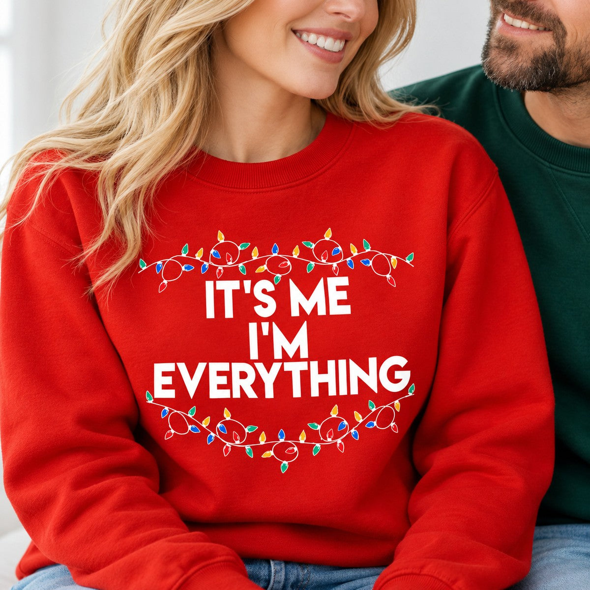 Close-up detail of Christmas light print and fabric texture on red couple sweatshirt