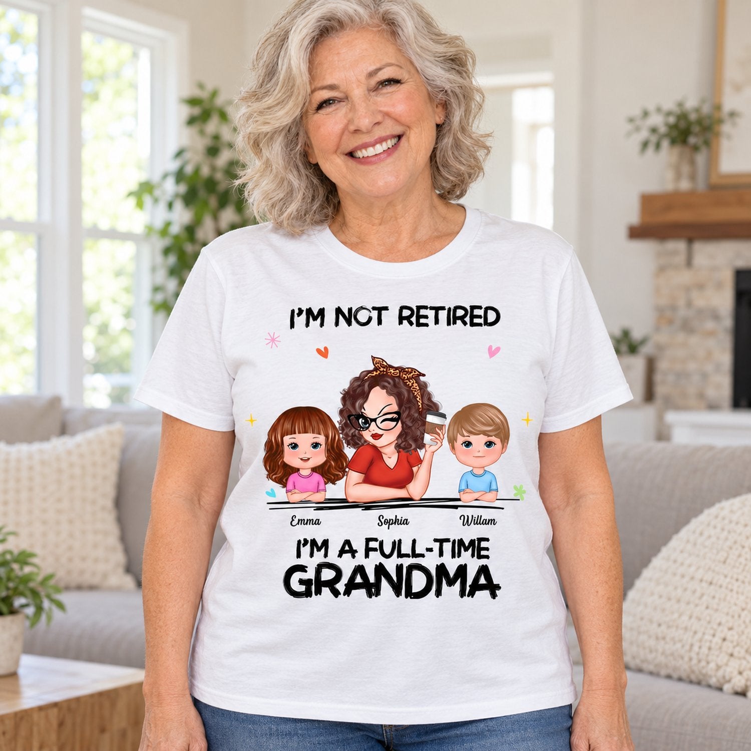 Grandma wearing personalized I'm Not Retired I'm A Full-Time Grandma custom white t-shirt in a bright living room