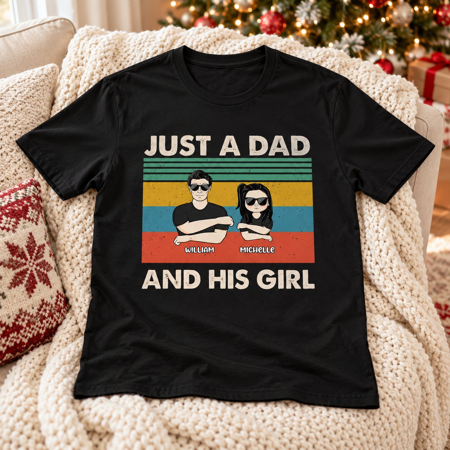 Personalized Just A Dad And His Girl black t-shirt laid on a cozy sofa near a Christmas tree