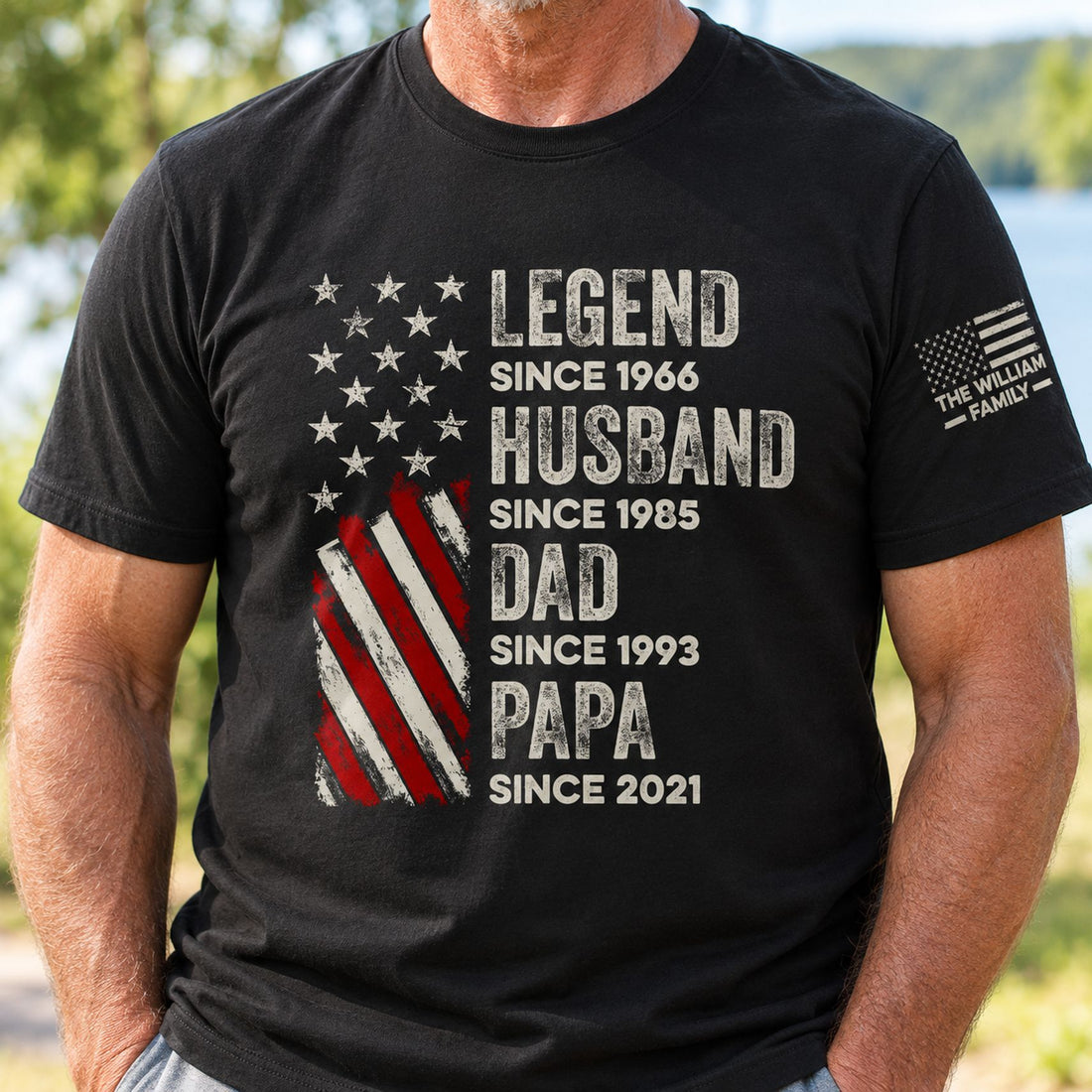 Close-up of distressed flag print and typography texture on black cotton t-shirt for Dad and Papa