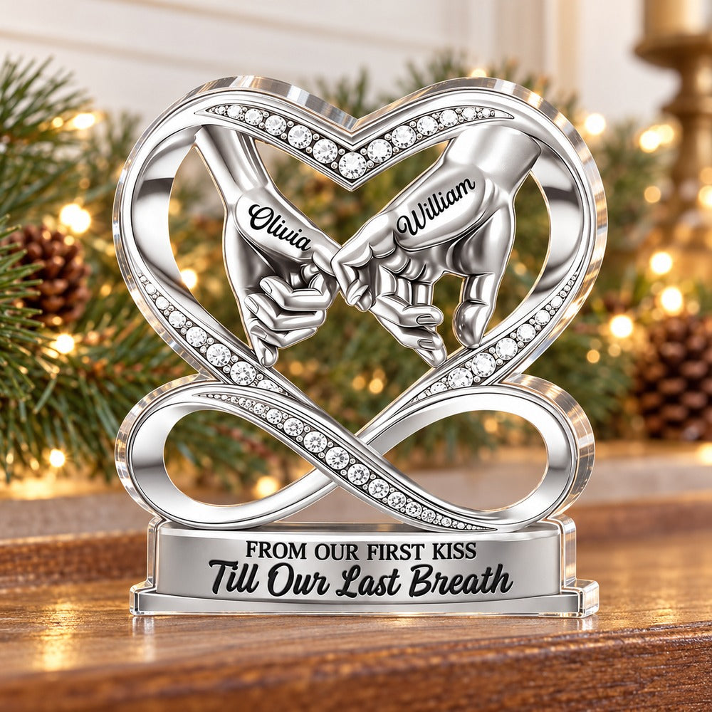 Personalized pinky promise couple acrylic plaque standing on a holiday mantel with pine garland
