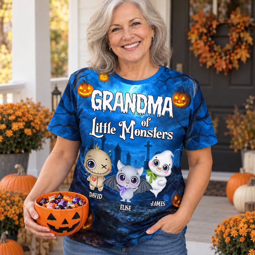 Grandma wearing personalized Grandma of Little Monsters all-over print Halloween t-shirt on autumn porch
