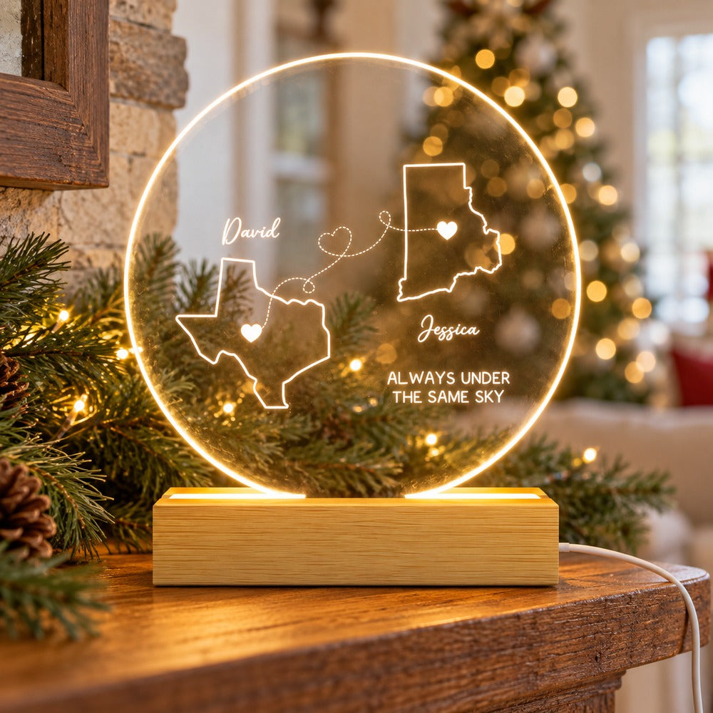 Personalized long distance couple 3D LED light wooden base glowing on a holiday mantelpiece