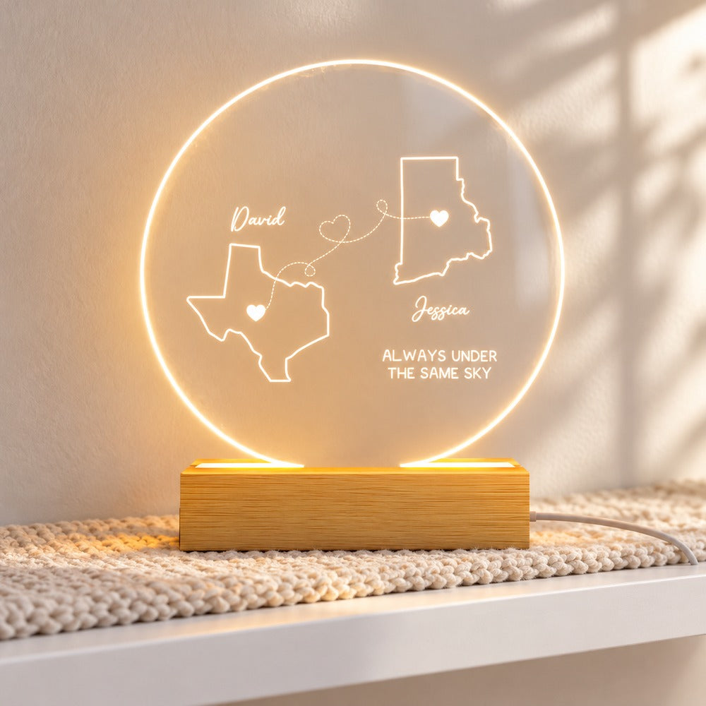 Long distance state map personalized LED night light displayed on a bright bedroom shelf