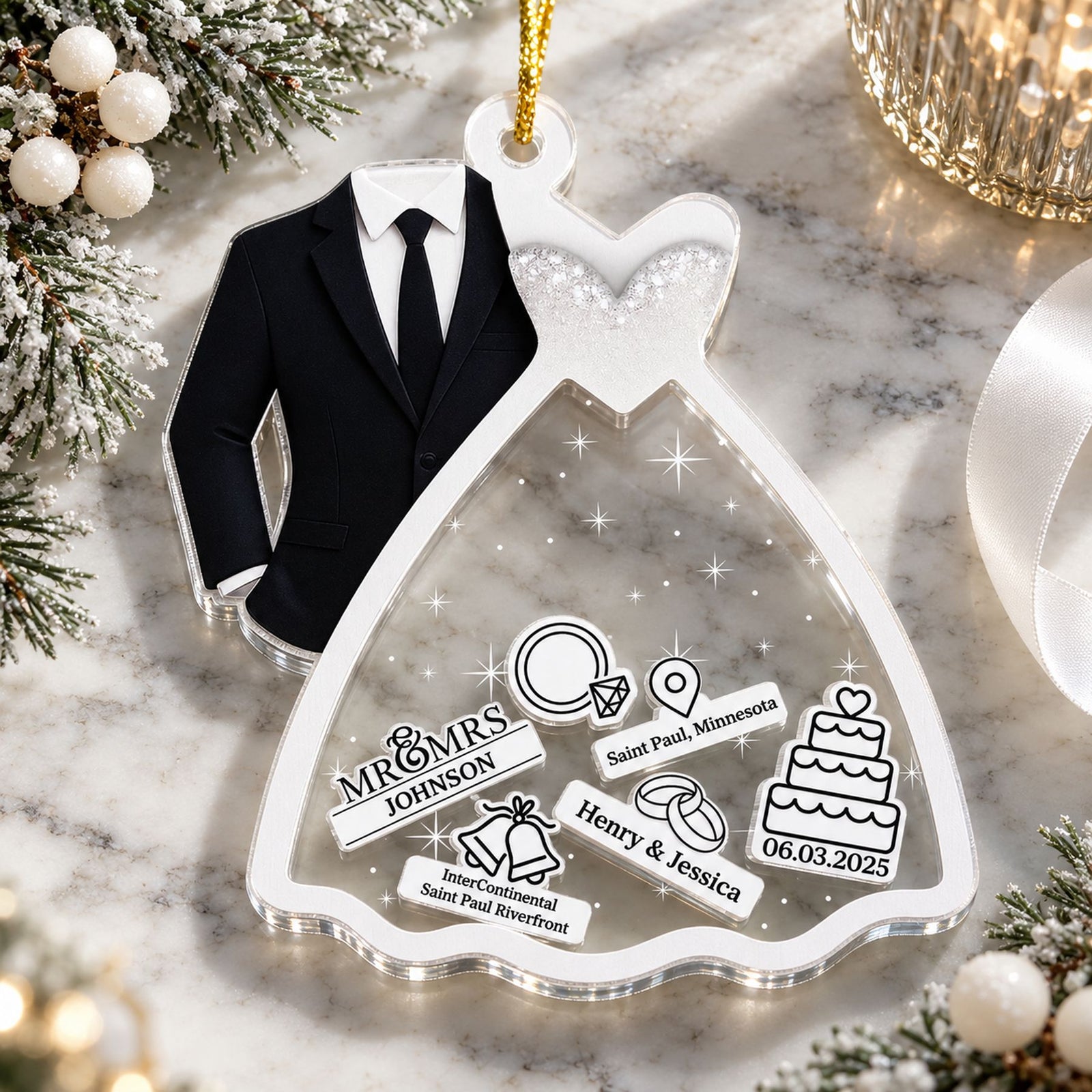 Christmas wedding shaker ornament lying flat on a holiday mantel with frosted pine