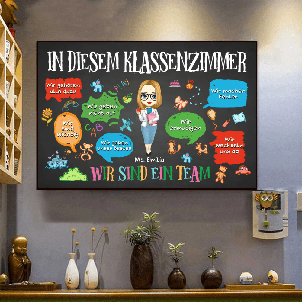 Personalized [German Version] In This Classroom We Are A Team poster, a woman hanging the framed print on a wall