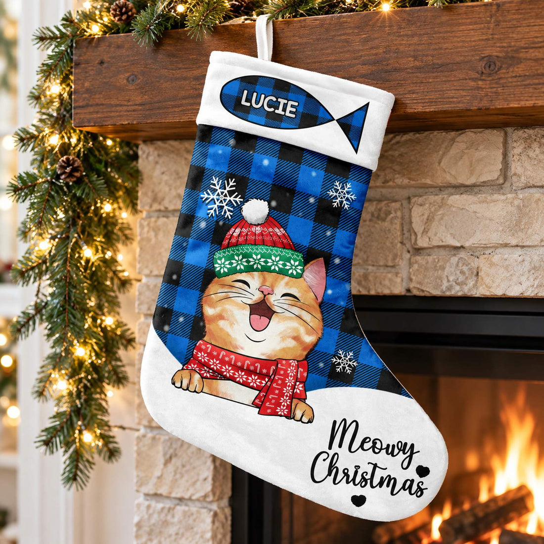 Personalized Meowy Christmas cat stocking LUCIE hanging on a festive fireplace mantel