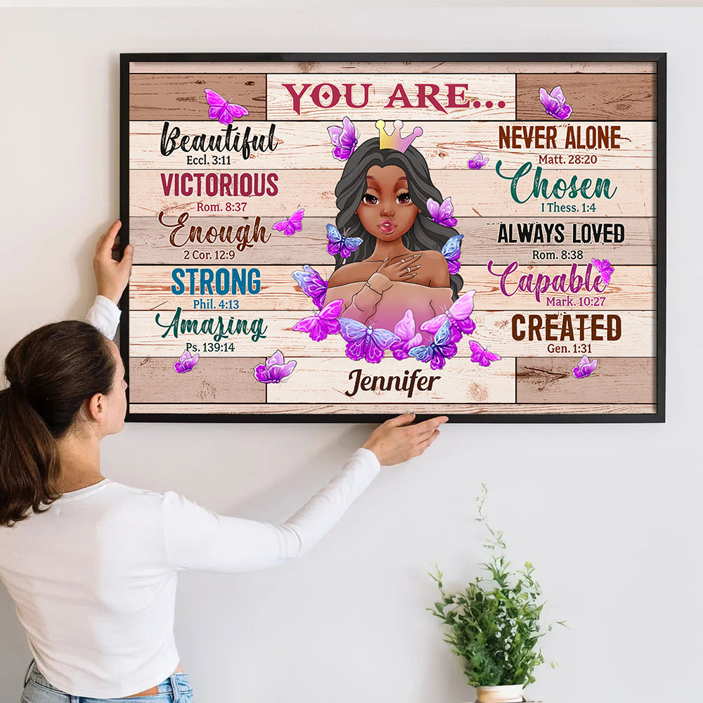 Personalized You Are Beautiful Bible Verse poster, a woman hanging the framed print on a wall