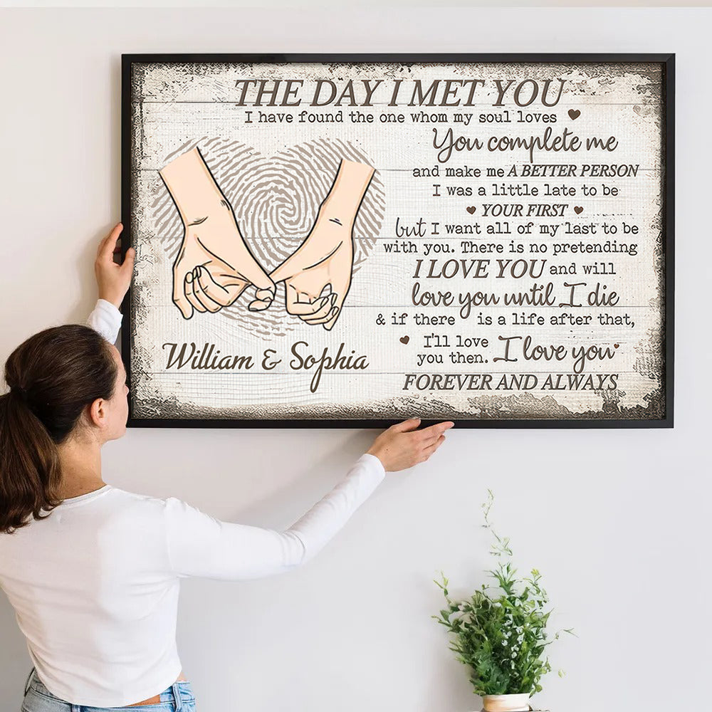 Personalized Custom Photo The Day I Met You canvas print, a woman hanging the framed print on a wall