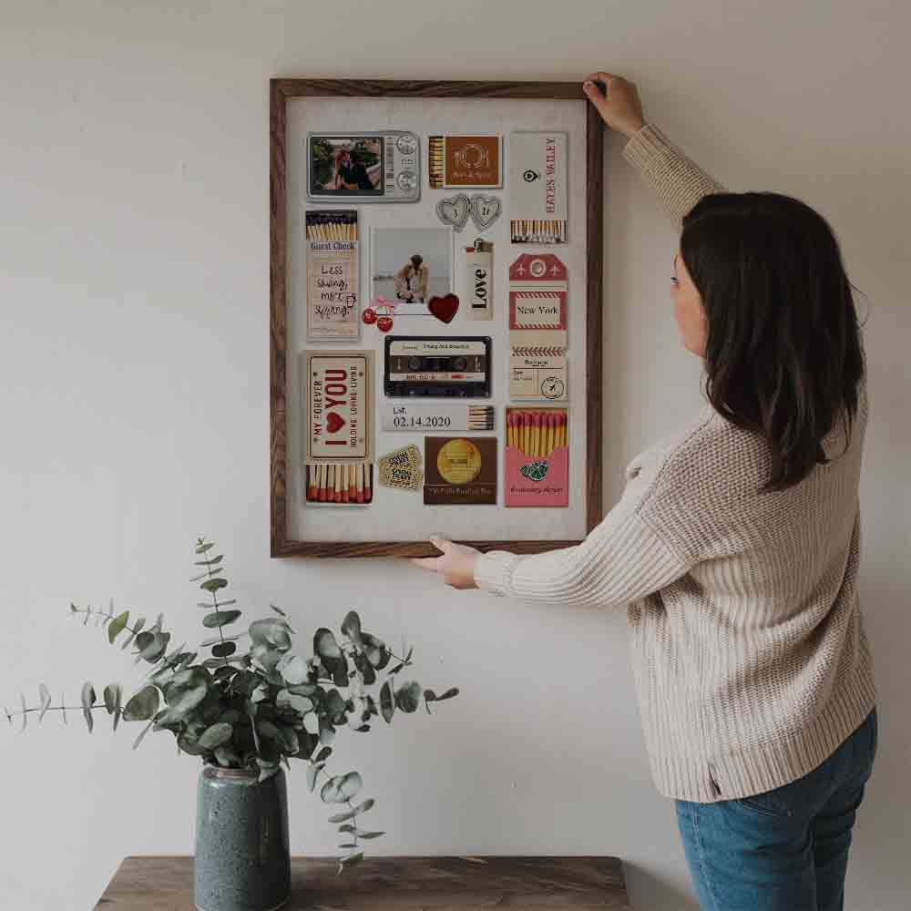 Custom Photo Romantic Couple Matchbox Art poster, a woman hanging the framed print on a wall