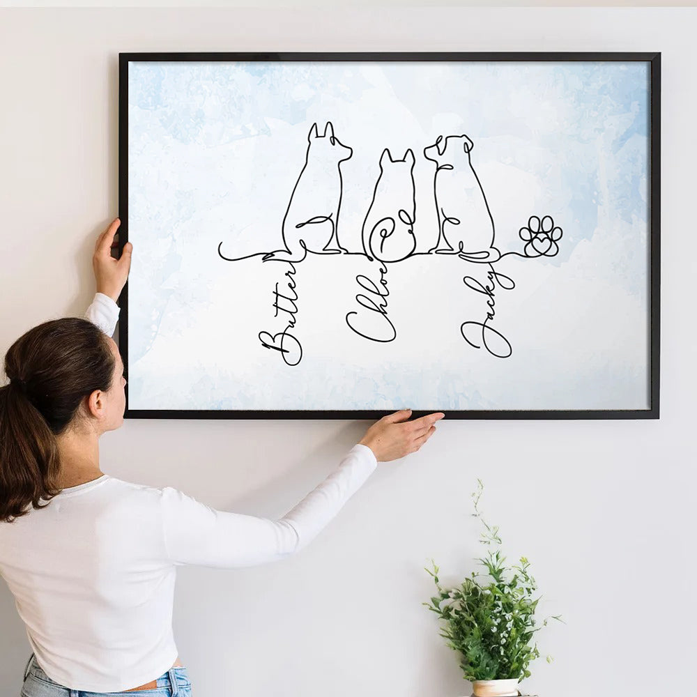 Personalized Adorable Dog Line Art poster, a woman hanging the framed print on a wall