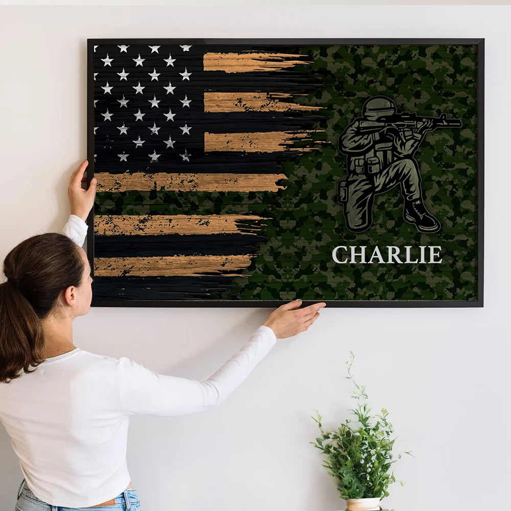 Personalized Half Thin Green Line Patriotic American Flag poster, a woman hanging the framed print on a wall