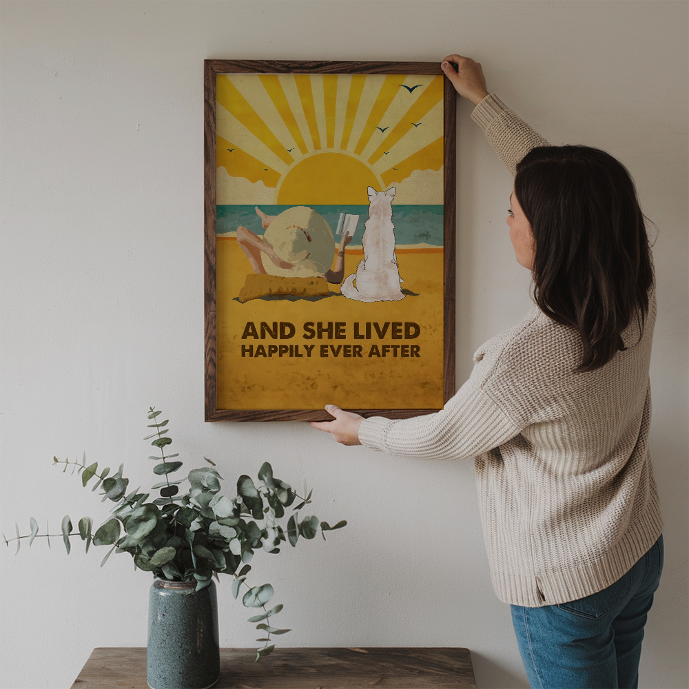 Personalized Dog Happily Ever After poster, a woman hanging the framed print on a wall