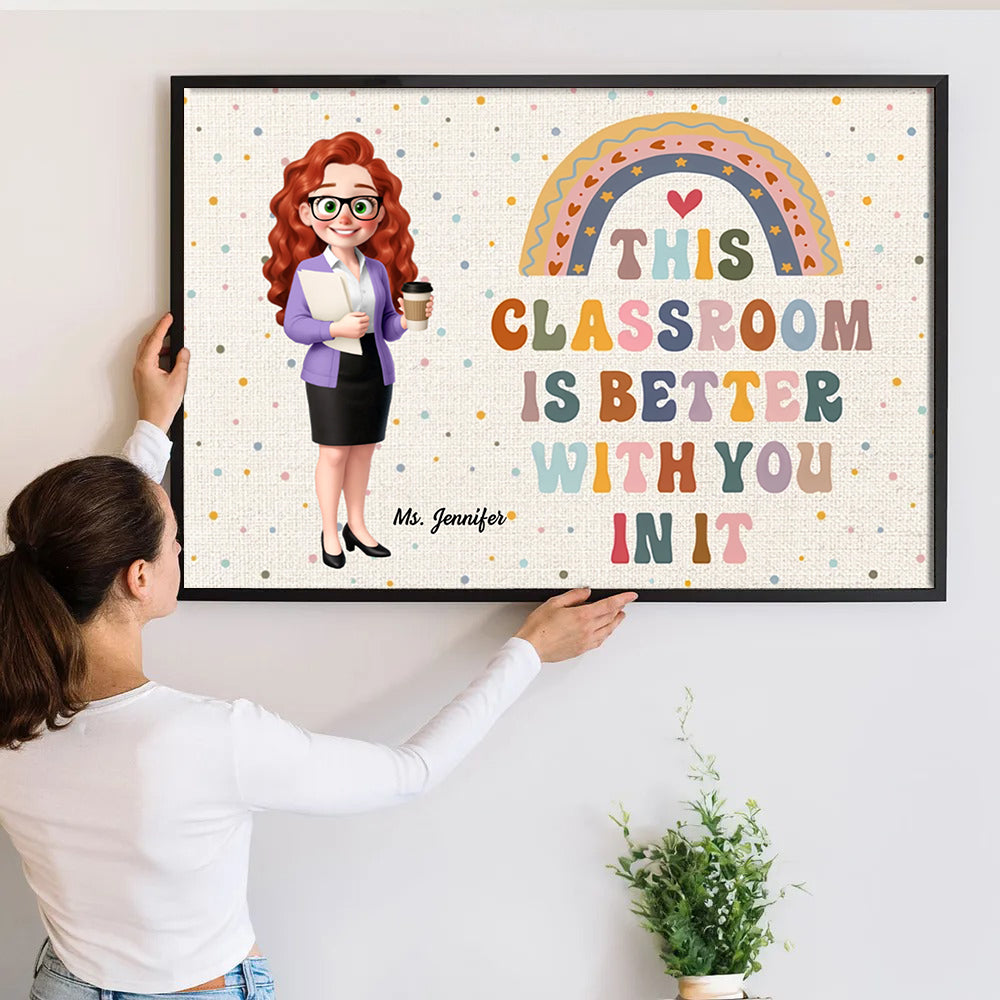 Personalized Teacher This Classroom Is Better With You In It poster, a woman hanging the framed print on a wall